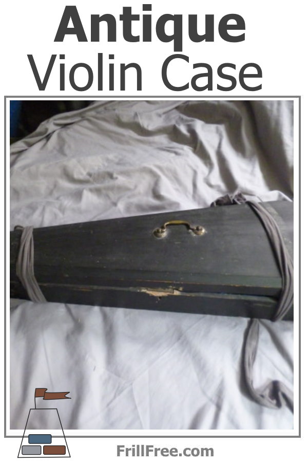 picture of an antique violin, in a wooden case