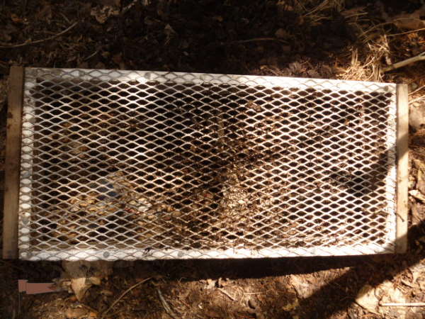 A simple screen for sieving compost