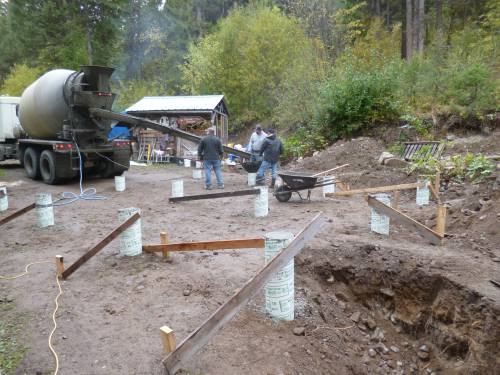 A two man crew, with one woman following along with a long piece of rebar to get the bubbles out is about right...