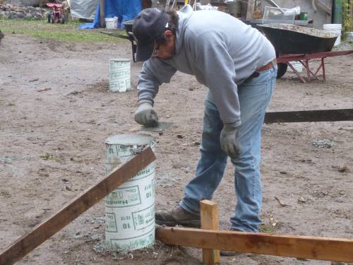 Troweling off the excess prevents any moisture from pooling...