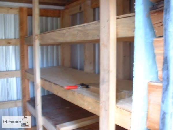 Plywood shelves on 2x4 lumber supports hold up the roof too...