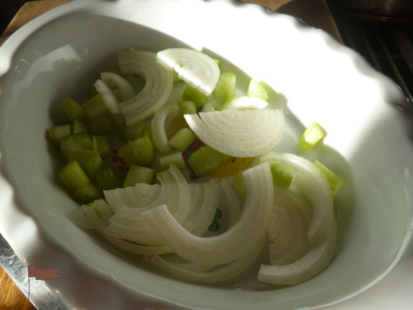 Celery and onions are cooked in the microwave on high for two minutes...