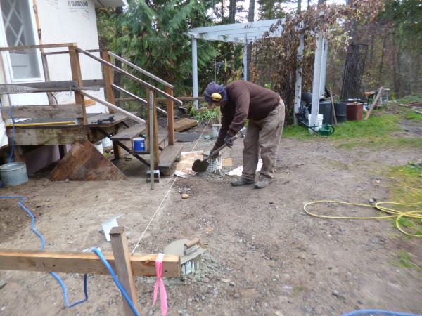 Leveling the top of the poured cement