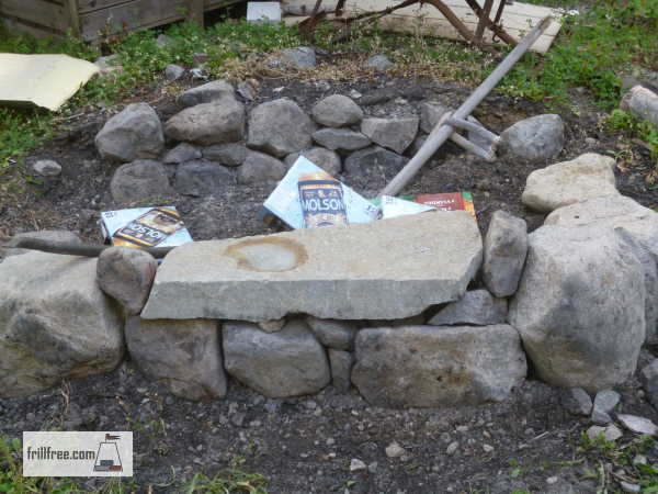 Lighting the first fire in the renovated fire pit