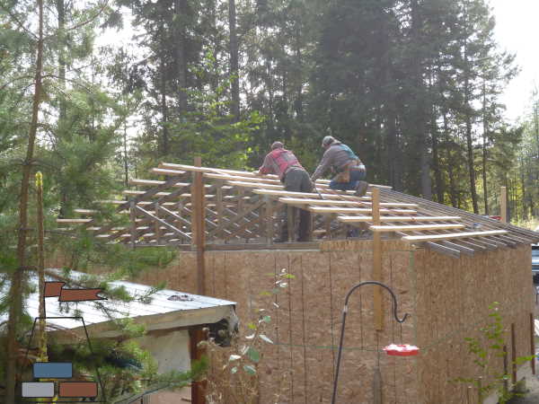 2x4 strapping is installed over the trusses