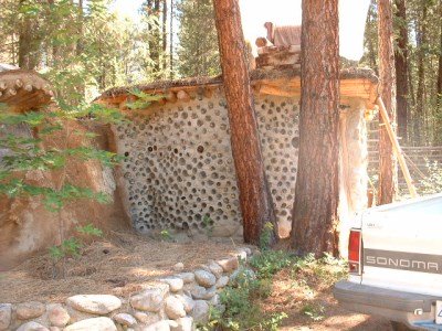 Unique handbuilt buildings, organically transformed out of natural and salvaged building materials